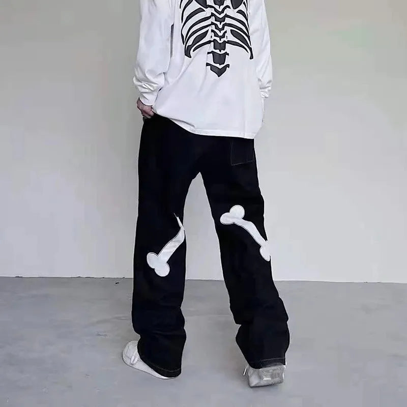 skeleton hands jeans